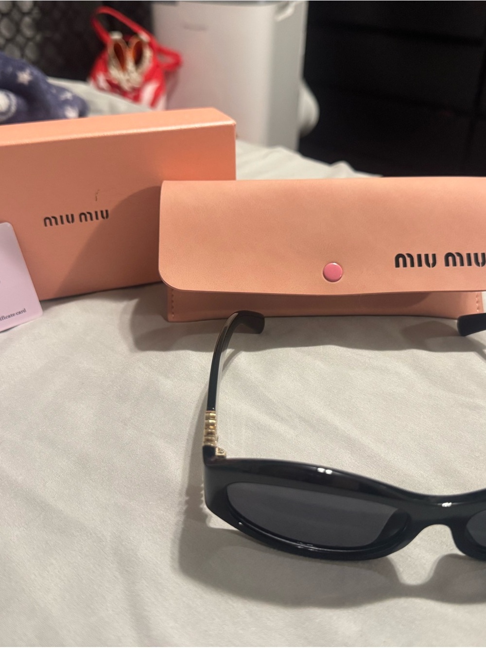 Authentic Miu Miu Black MU 06ZS oval with Pink Case